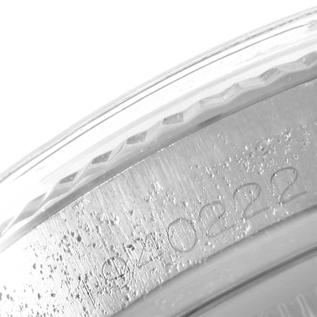 This image shows the edge and serial number engraving on the case back of the Vintage Collection model by Rolex.