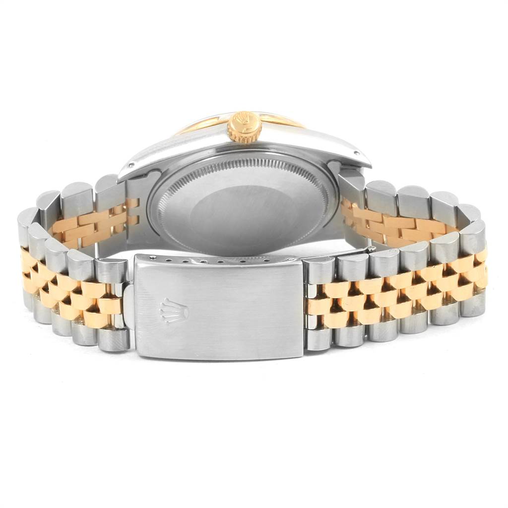 The image shows the back and strap of a Rolex Vintage Collection 16013 Men's Stainless Steel Black Dial 16013 Men's Stainless Steel Black Dial model, with a two-tone metal bracelet and clasp visible.