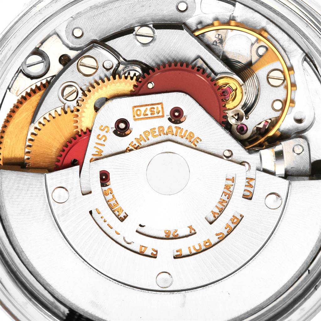 This image shows a close-up of the intricate internal mechanism of a Rolex Vintage Collection 1501 Men's Stainless Steel Black Dial 1501 Men's Stainless Steel Black Dial model watch.