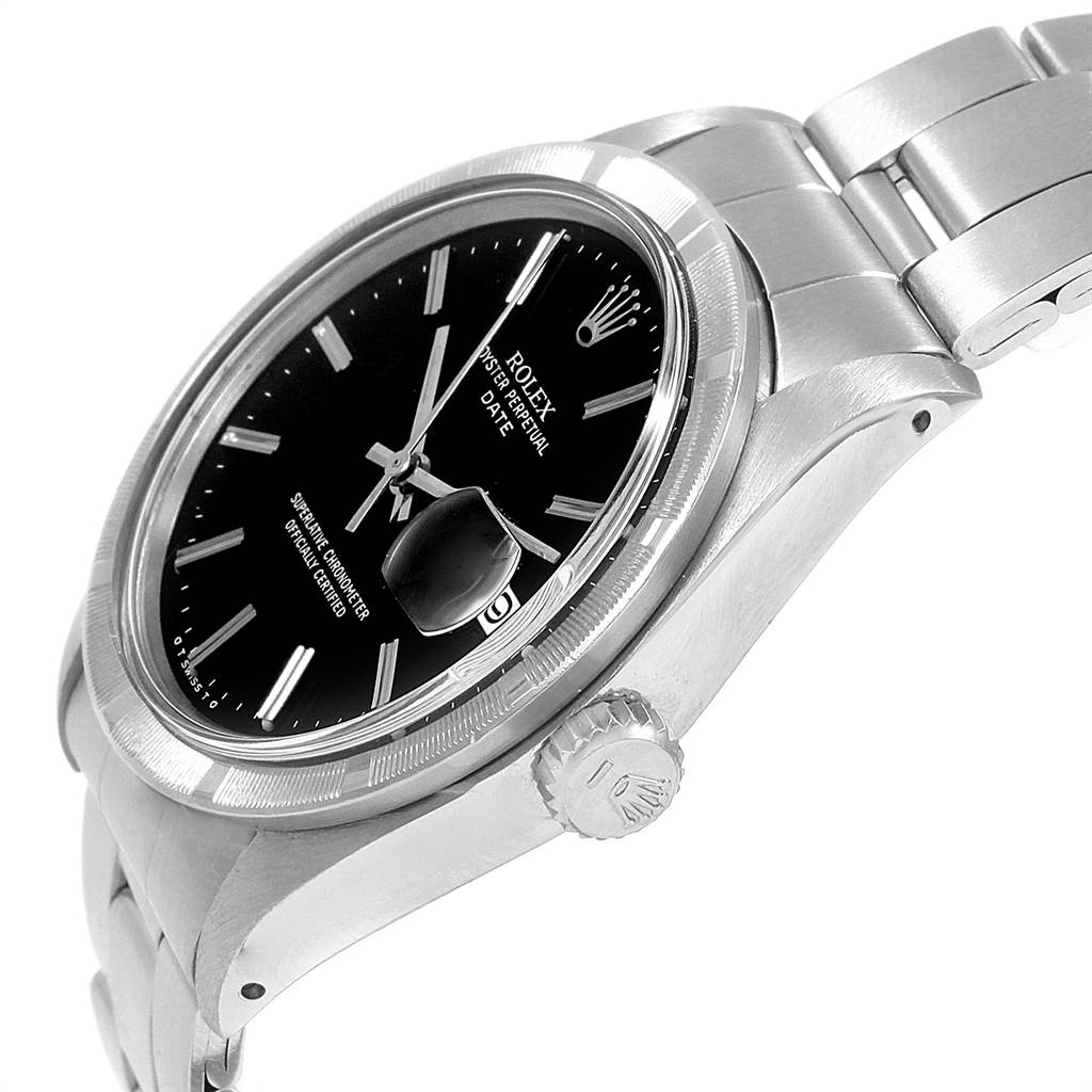 The image shows a side angle of the Rolex Vintage Collection 1501 Men's Stainless Steel Black Dial 1501 Men's Stainless Steel Black Dial watch, highlighting the face, bezel, crown, and part of the bracelet.