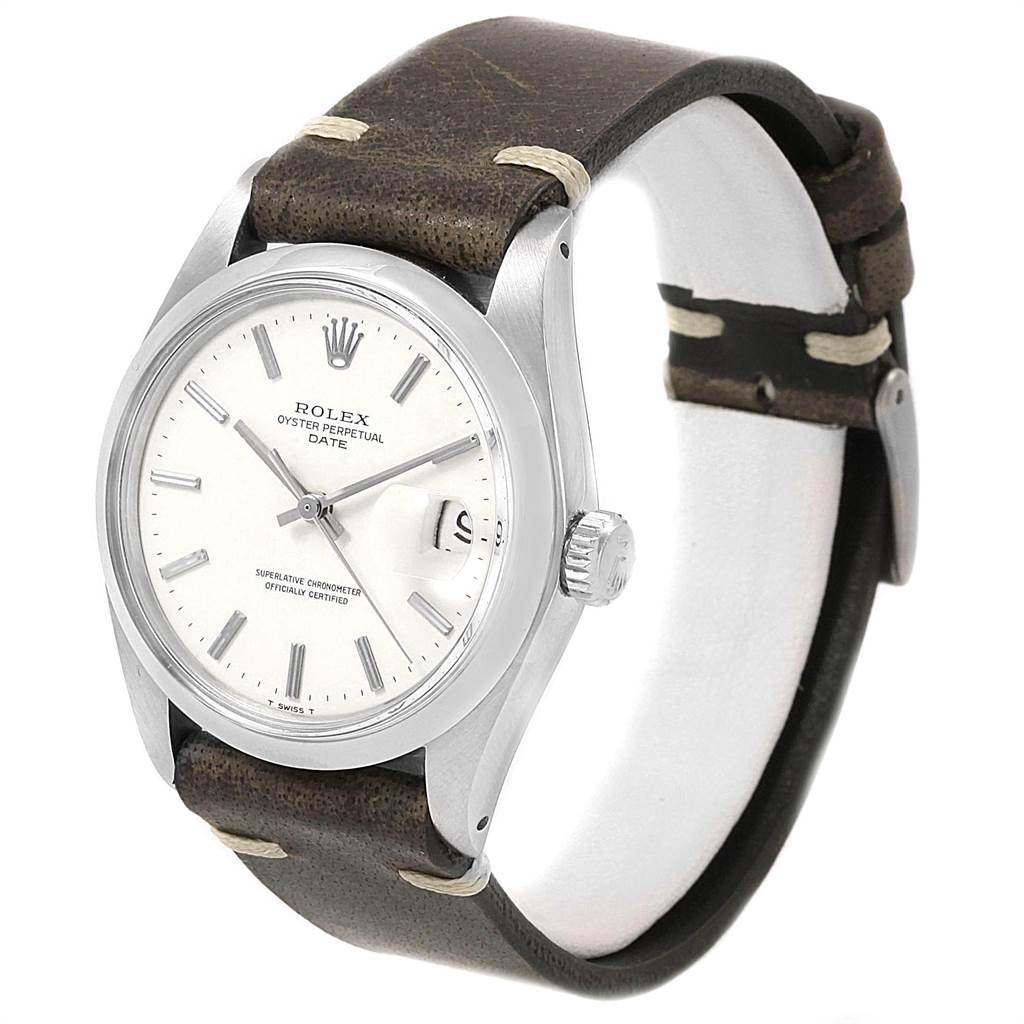 This is a front and angled side view of a Rolex Vintage Collection 1500 Men's Stainless Steel White Dial 1500 Men's Stainless Steel White Dial Oyster Perpetual Date watch, showing the dial, crown, and leather strap.