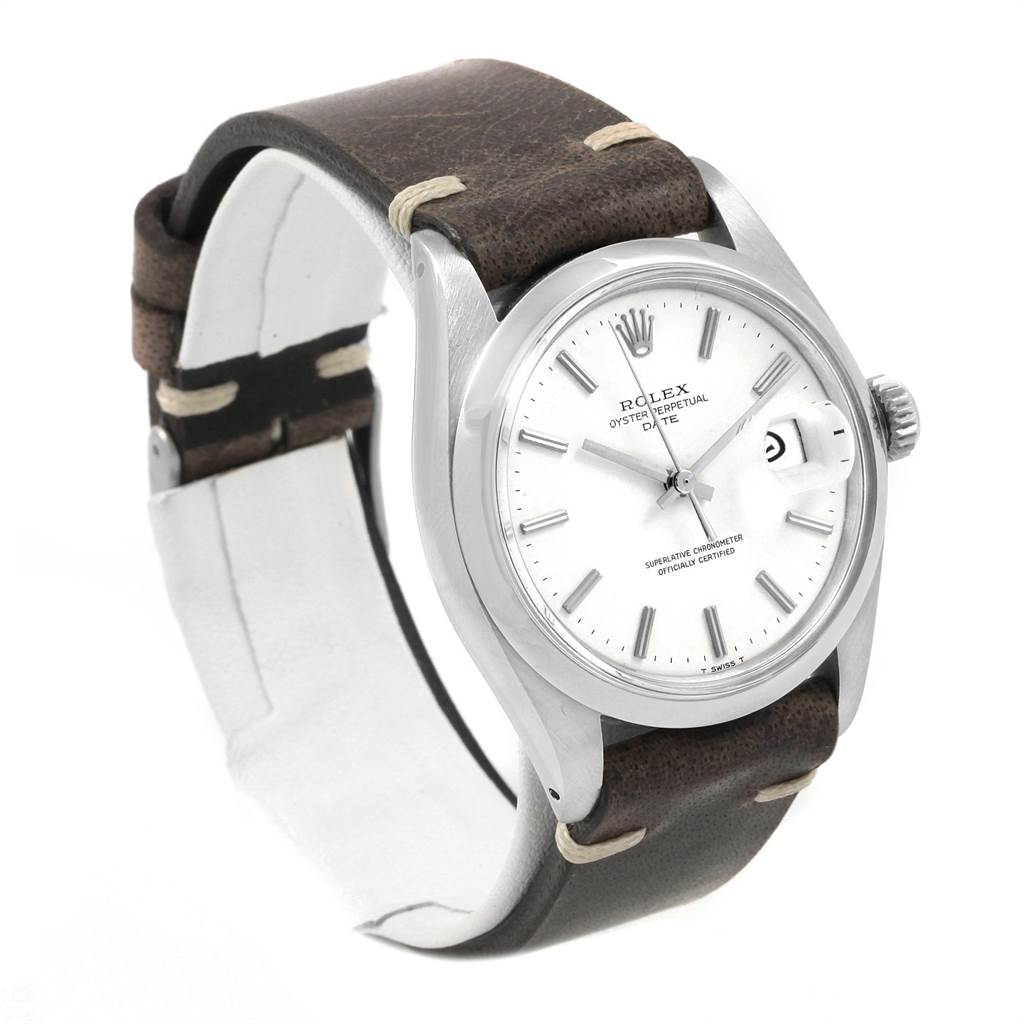 The image displays a Rolex Vintage Collection 1500 Men's Stainless Steel White Dial 1500 Men's Stainless Steel White Dial watch at a three-quarter angle, showcasing its dial, bezel, crown, and leather strap.