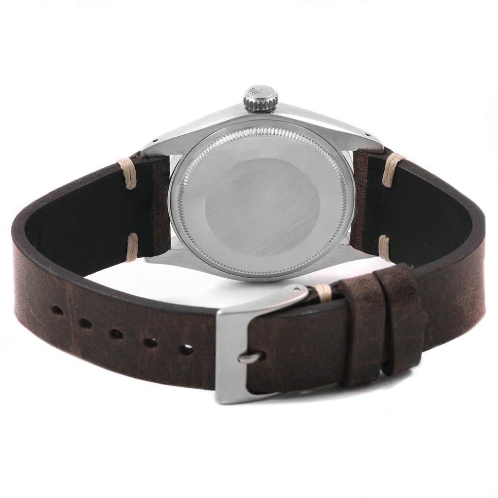 The image shows the back case and leather strap of a Rolex Vintage Collection 1500 Men's Stainless Steel White Dial 1500 Men's Stainless Steel White Dial watch.