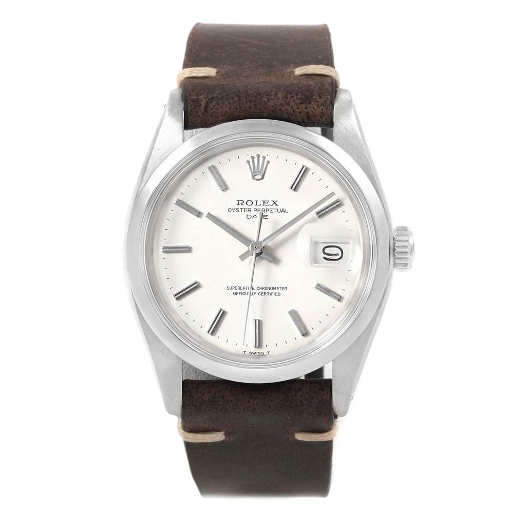The image shows a front view of a Rolex Vintage Collection 1500 Men's Stainless Steel White Dial 1500 Men's Stainless Steel White Dial watch with a brown leather strap and a silver dial.