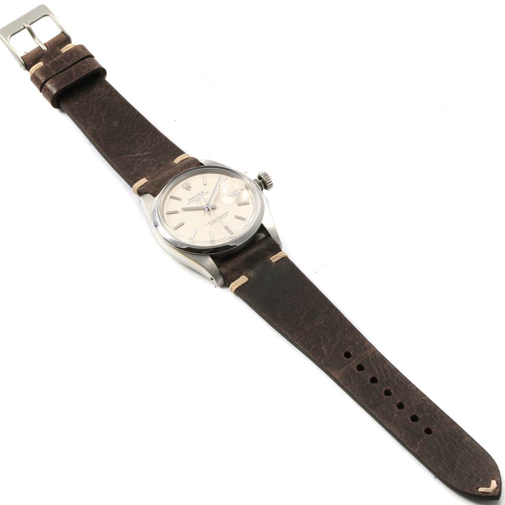 The Rolex Vintage Collection 1500 Men's Stainless Steel White Dial 1500 Men's Stainless Steel White Dial model is shown at a slight elevated angle, displaying its dial, case, crown, and leather strap.