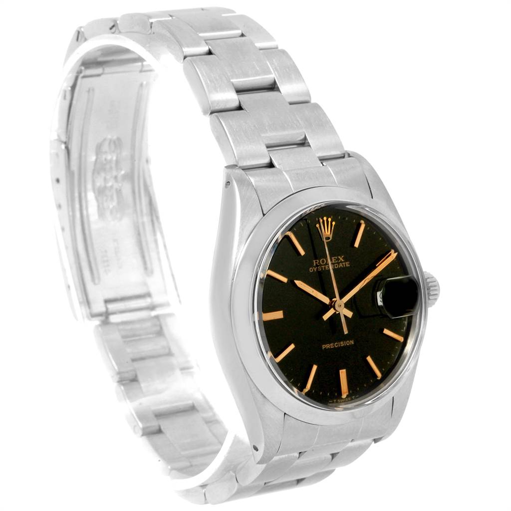 The photo shows a side angle of the Rolex Vintage Collection 6694 Men's Stainless Steel Black Dial 6694 Men's Stainless Steel Black Dial watch, highlighting the face, bezel, and metal bracelet.