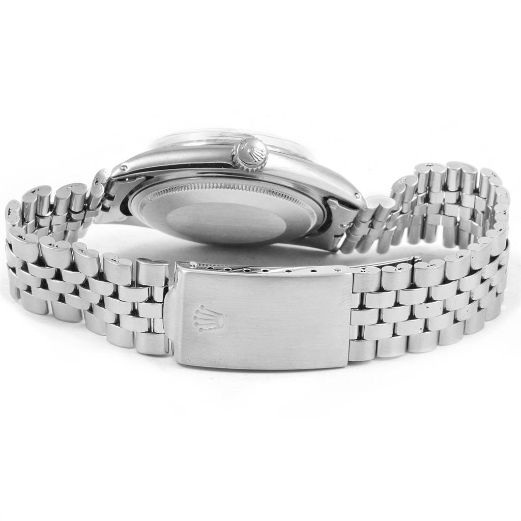 The image shows the back case and clasp of a Rolex Vintage Collection 1603 Men's Stainless Steel Silver Dial 1603 Men's Stainless Steel Silver Dial watch in a partially opened position.