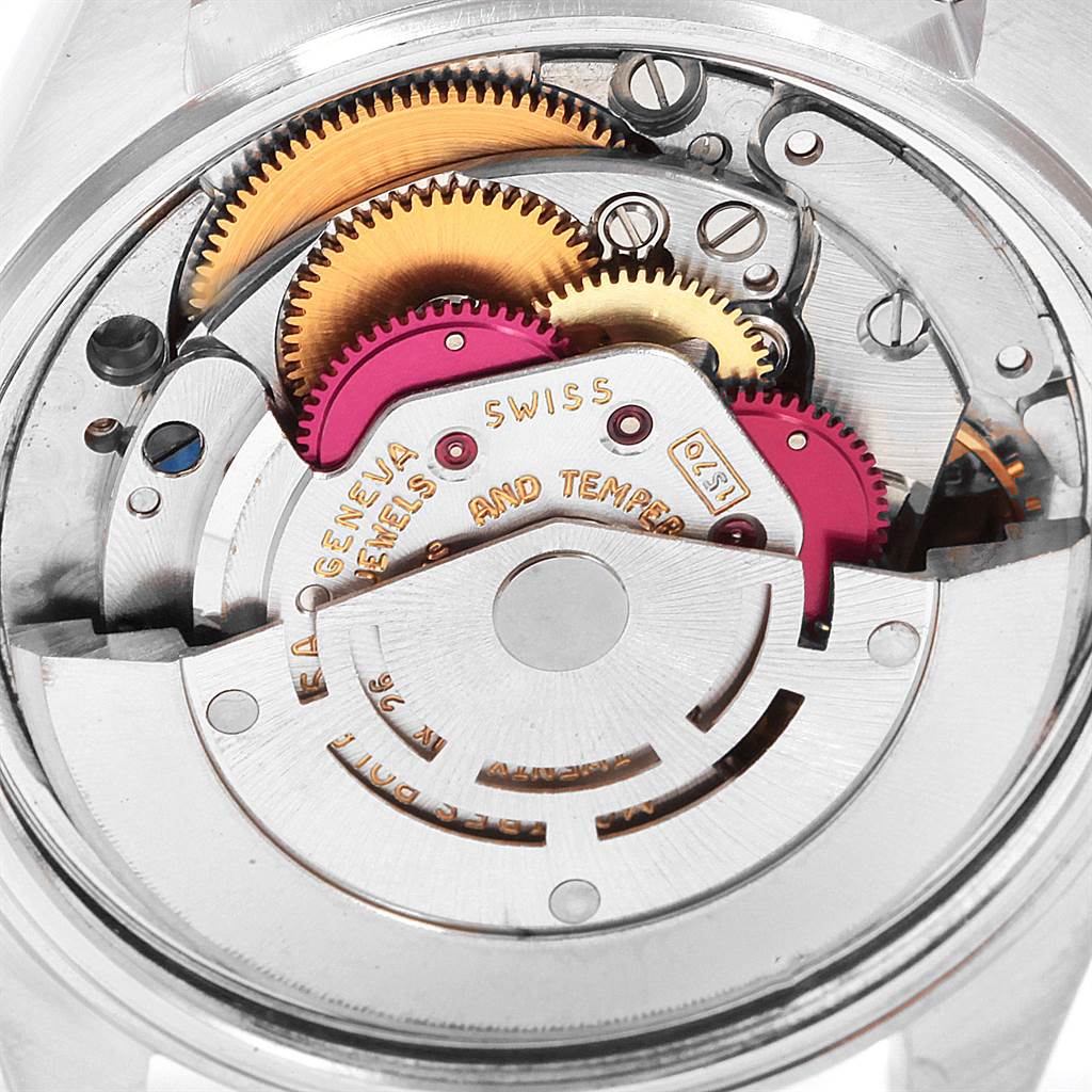 The image shows the intricate inner mechanical components of a Rolex Vintage Collection 1603 Men's Stainless Steel Silver Dial 1603 Men's Stainless Steel Silver Dial model from the backside.