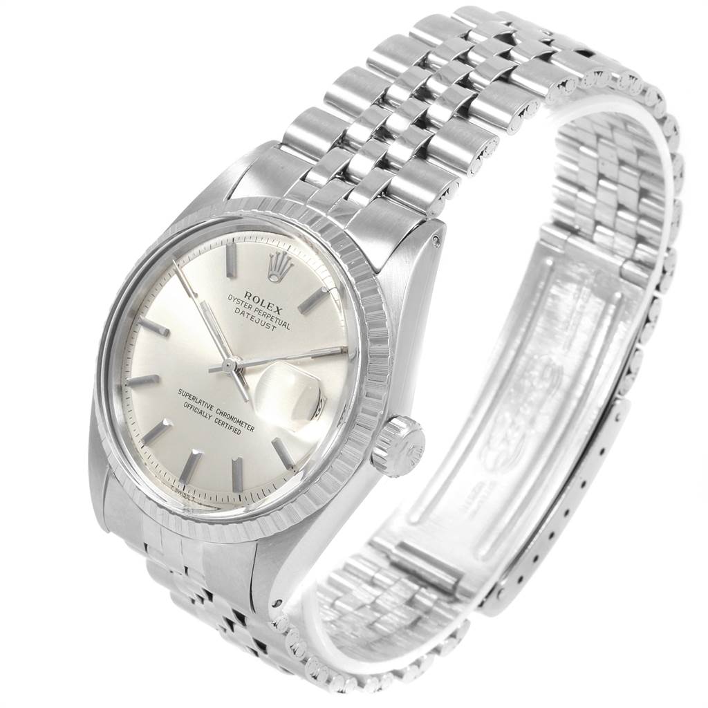 The Vintage Collection Rolex watch is shown at an angled view displaying the face, bezel, crown, and partially opened bracelet.