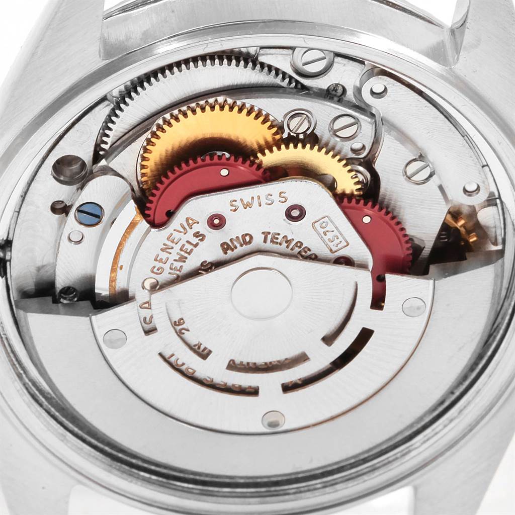 This image shows the intricate inner workings and gears of a Rolex Vintage Collection 1603 Men's Stainless Steel Silver Dial 1603 Men's Stainless Steel Silver Dial model watch viewed from the back.