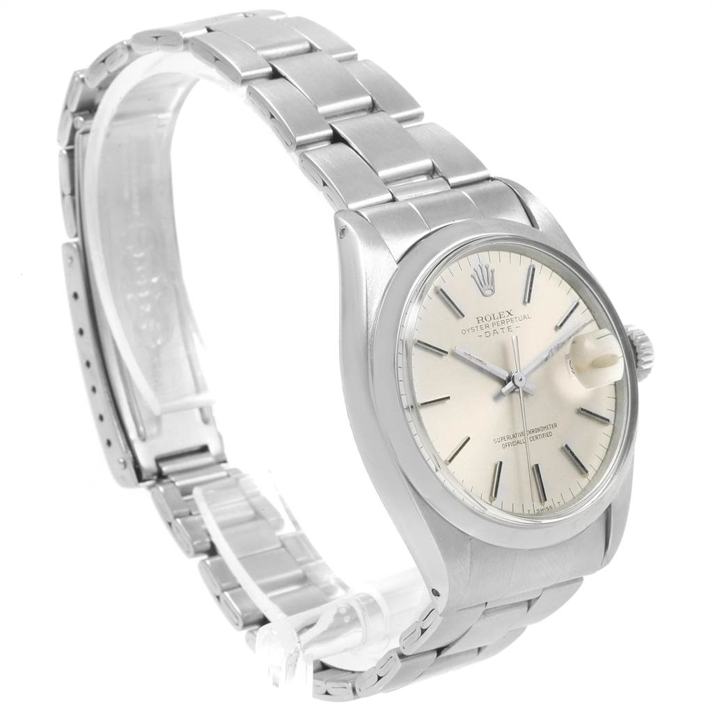 The image shows a side angle of a Vintage Collection Rolex watch, highlighting its dial, casing, and metal bracelet.