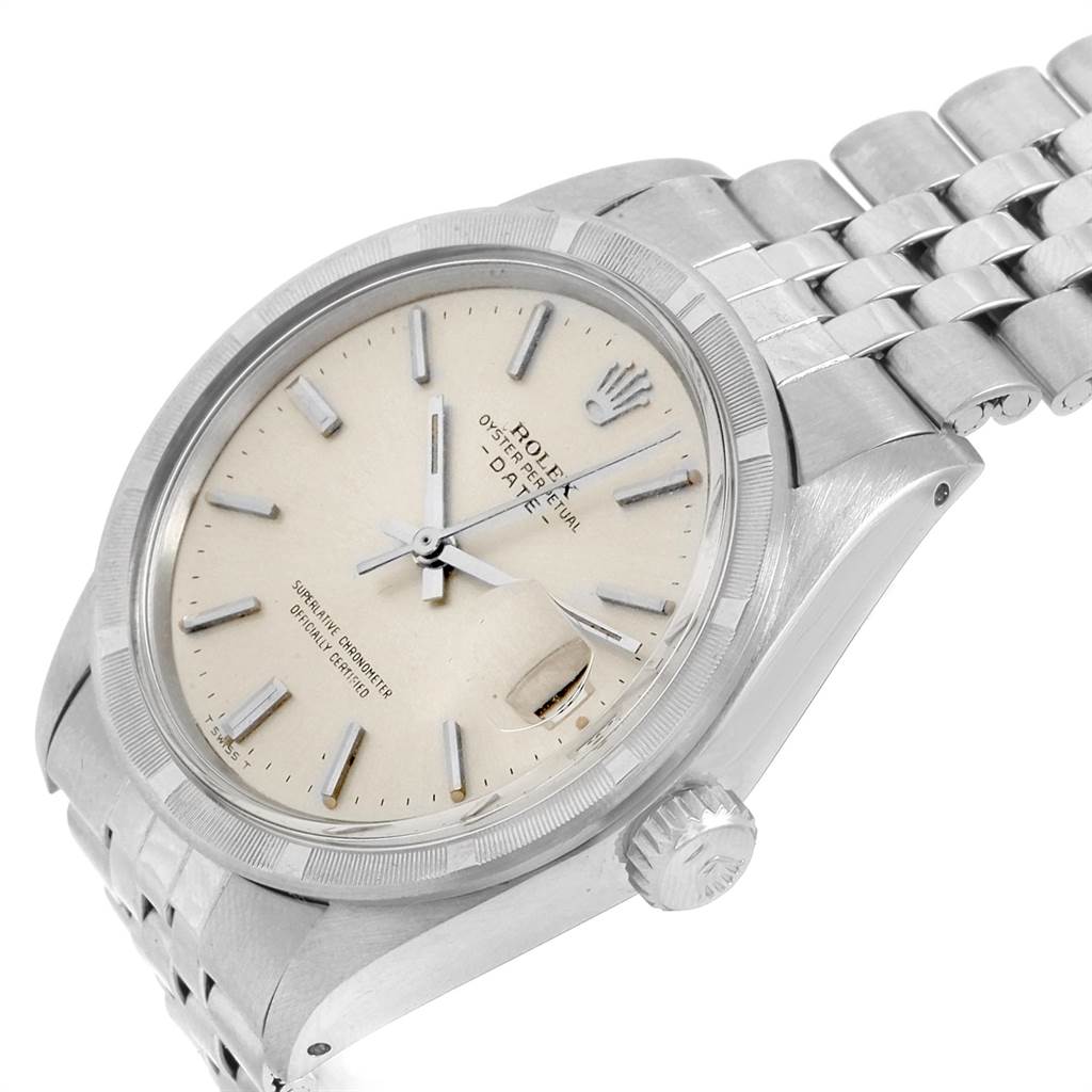 The Vintage Collection Rolex watch is shown at a slight angle, highlighting its face, bezel, crown, and bracelet.