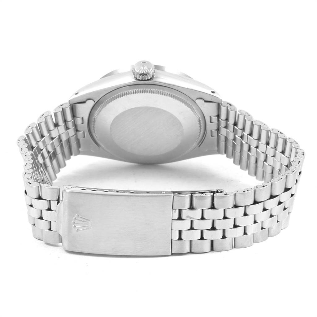 The image shows the back view of a Rolex Vintage Collection 1501 Men's Stainless Steel Silver Dial 1501 Men's Stainless Steel Silver Dial watch, focusing on the case back and metal bracelet with a clasp.