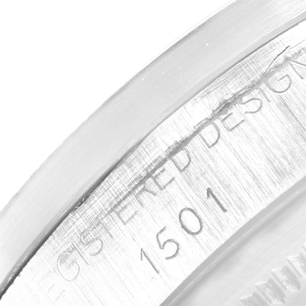The image shows a close-up of the engraved case back of a Vintage Collection Rolex model 1501.