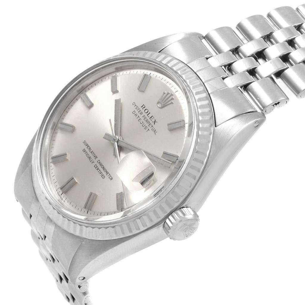 The Vintage Collection Rolex watch is shown at a slight angle, displaying the face, crown, bezel, and part of the bracelet.