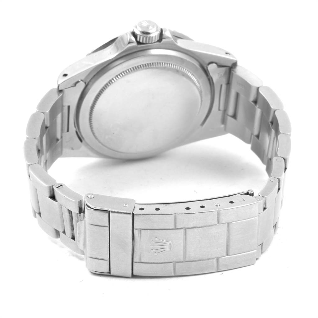 The image shows the back case, crown, and metal bracelet with clasp of a Rolex Vintage Collection 1680 Men's Stainless Steel Black Dial 1680 Men's Stainless Steel Black Dial watch.