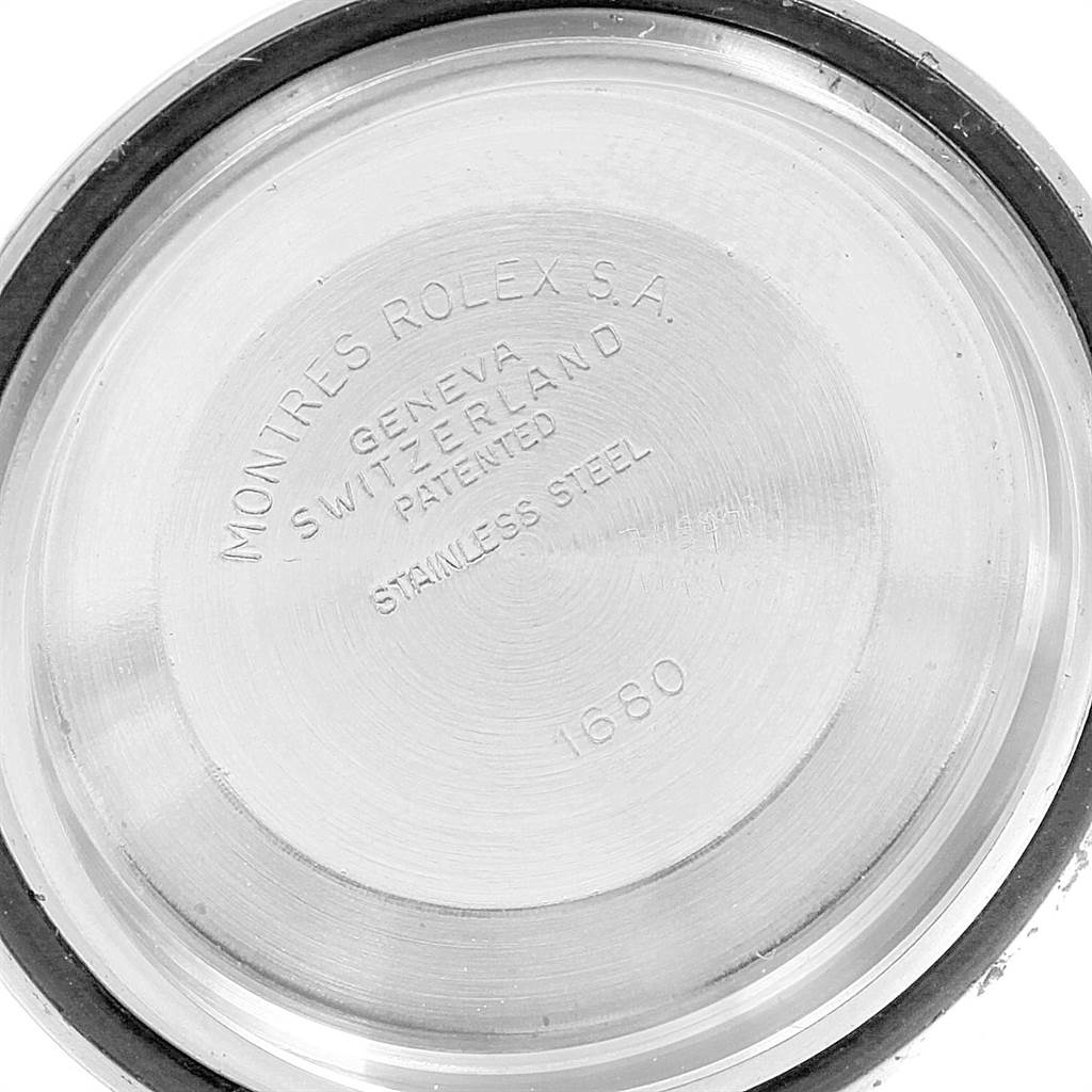 The image shows the stainless steel case back of a Rolex Vintage Collection 1680 Men's Stainless Steel Black Dial 1680 Men's Stainless Steel Black Dial model, displaying the inside engraving details and model number 1680.