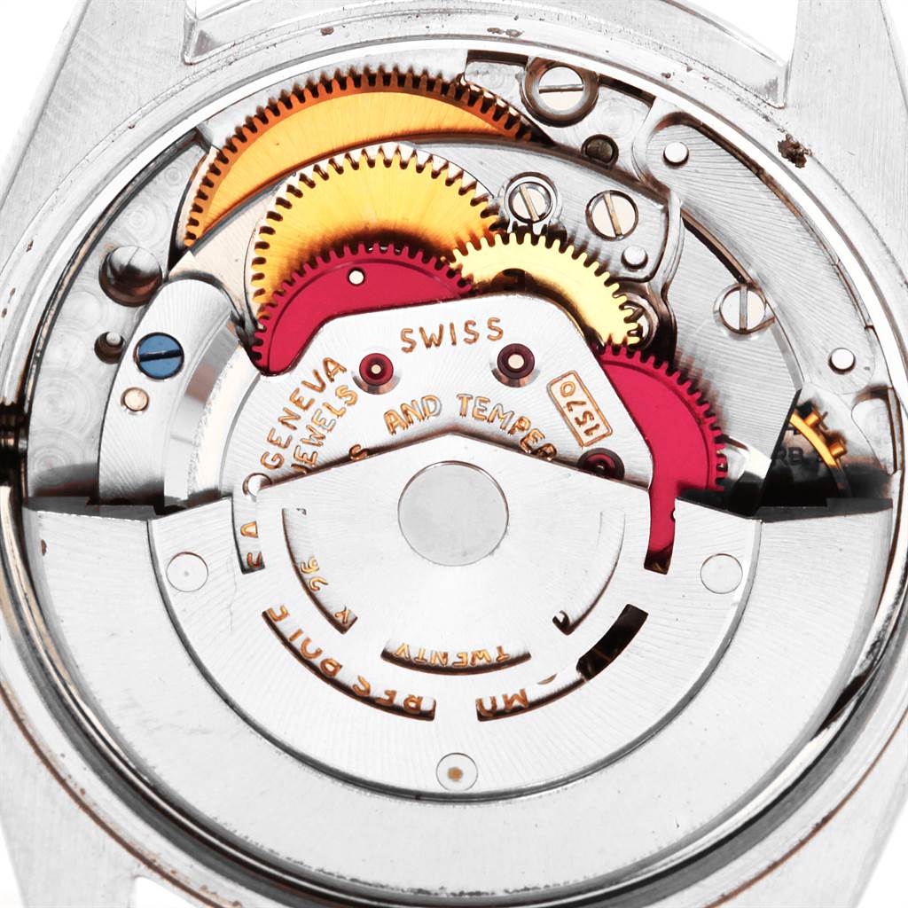 This is a close-up view of the inner mechanism and gears of a Vintage Collection model by Rolex.