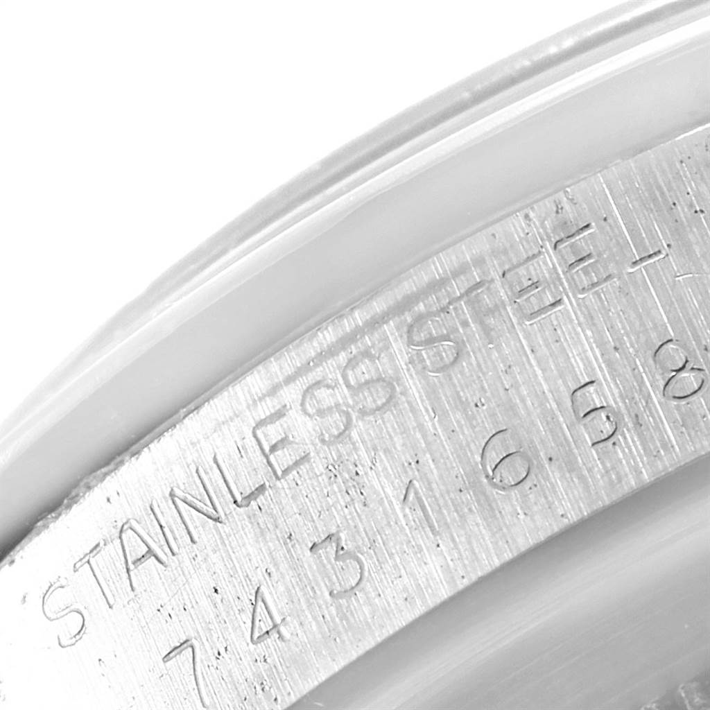 This image shows the engraved stainless steel casing of the Vintage Collection model by Rolex.