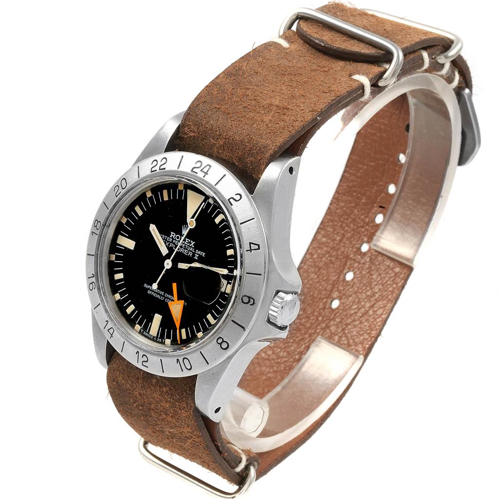 The image features a Rolex Vintage Collection 1655 Men's Stainless Steel Black Dial 1655 Men's Stainless Steel Black Dial watch viewed from an angled perspective, displaying the face, bezel, and a brown leather strap.