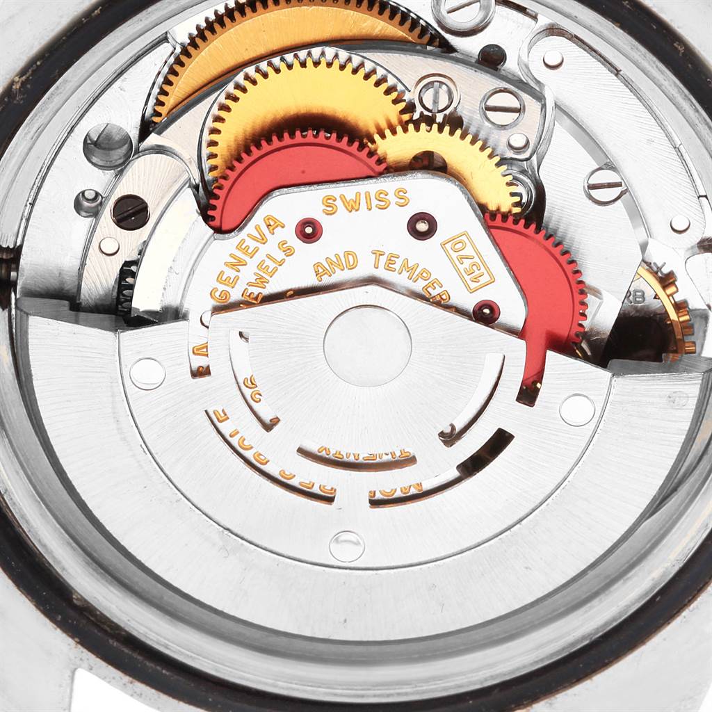 The image shows a close-up of the inner mechanical movements of the Vintage Collection model by Rolex.
