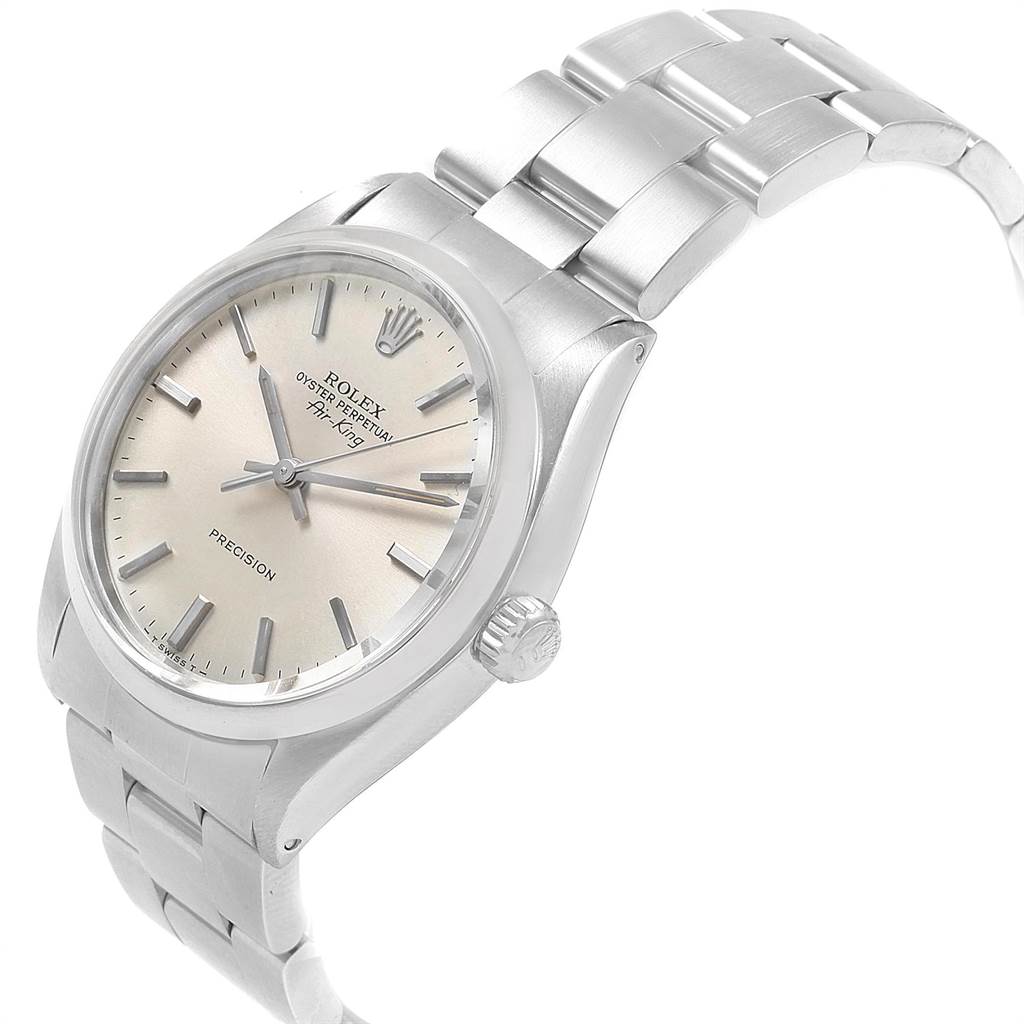 The image shows a side angle of a Rolex Vintage Collection 5500 Men
s Stainless Steel Silver Dial 5500 Men
s Stainless Steel Silver Dial watch, displaying its face, crown, and bracelet.