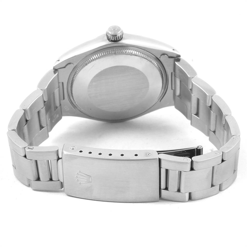 This image shows the back case and bracelet clasp of a Rolex Vintage Collection 5500 Men
s Stainless Steel Silver Dial 5500 Men
s Stainless Steel Silver Dial watch.