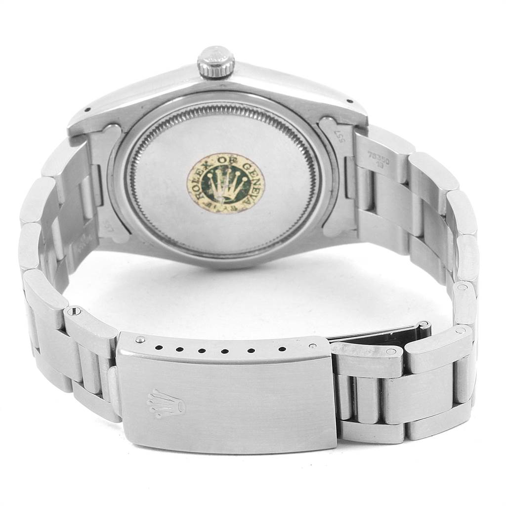 The image shows the back case and bracelet of a Rolex Vintage Collection 6694 Men
s Stainless Steel Silver Dial 6694 Men
s Stainless Steel Silver Dial watch, viewed from a rear angle.