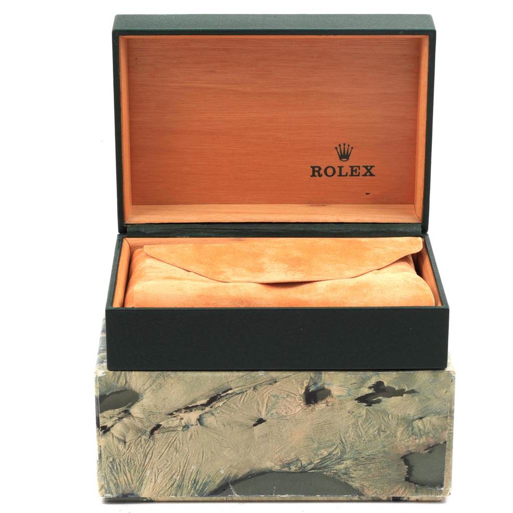 This image shows an open Rolex Vintage Collection 6694 Men
s Stainless Steel Silver Dial 6694 Men
s Stainless Steel Silver Dial watch box, revealing its interior lining and pillow.