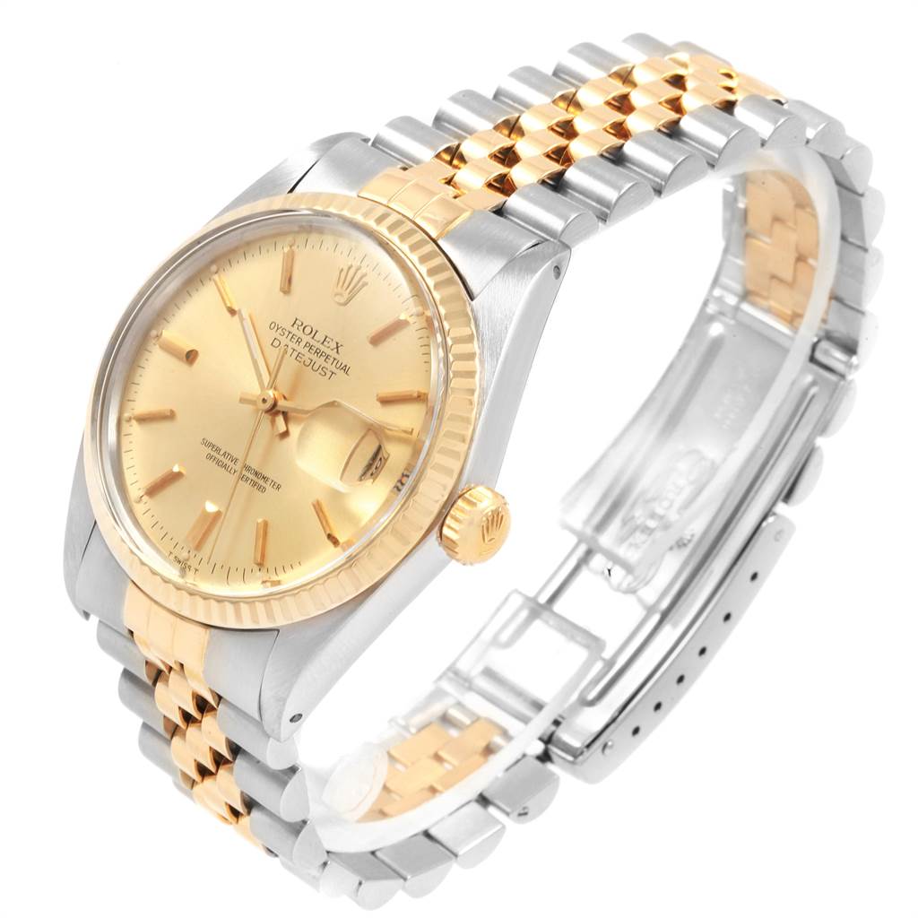 The image shows a Rolex Vintage Collection 16013 Men
s Stainless Steel Champagne Dial 16013 Men
s Stainless Steel Champagne Dial watch from a three-quarter angle, highlighting its gold and silver bracelet, gold dial, and crown.