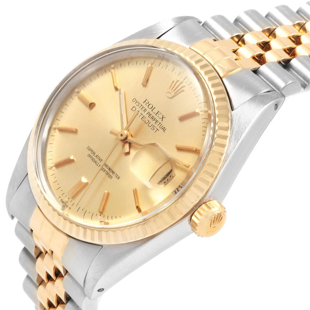 The Rolex Vintage Collection 16013 Men
s Stainless Steel Champagne Dial 16013 Men
s Stainless Steel Champagne Dial watch is shown at a slightly tilted angle, displaying its gold dial, bezel, crown, and part of the bracelet.