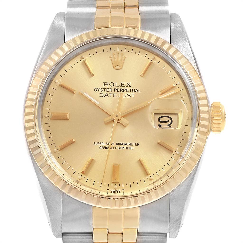 The Rolex Vintage Collection 16013 Men
s Stainless Steel Champagne Dial 16013 Men
s Stainless Steel Champagne Dial Datejust watch is shown from a front angle, highlighting its bezel, dial, hands, and part of the bracelet.