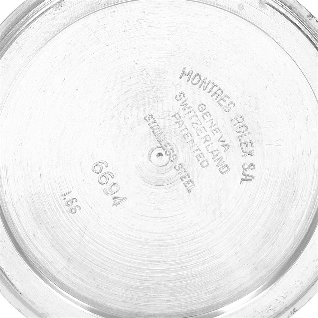 The image shows the inside case back of a Rolex Vintage Collection 6694 Men
s Stainless Steel Silver Dial 6694 Men
s Stainless Steel Silver Dial model.