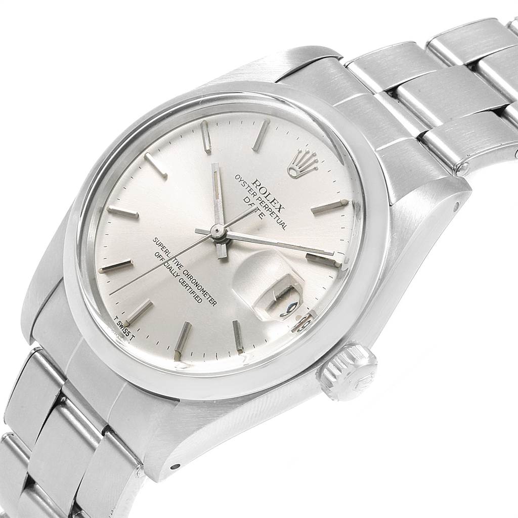 The image shows a close-up angle of the Rolex Vintage Collection 1500 Men
s Stainless Steel Silver Dial 1500 Men
s Stainless Steel Silver Dial model, displaying its dial, bracelet, and crown.