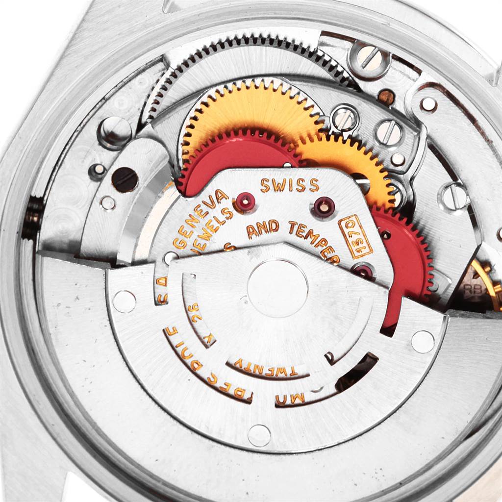 The image shows the internal mechanism and gears of the Rolex Vintage Collection 1500 Men
s Stainless Steel Silver Dial 1500 Men
s Stainless Steel Silver Dial watch from a close-up angle.