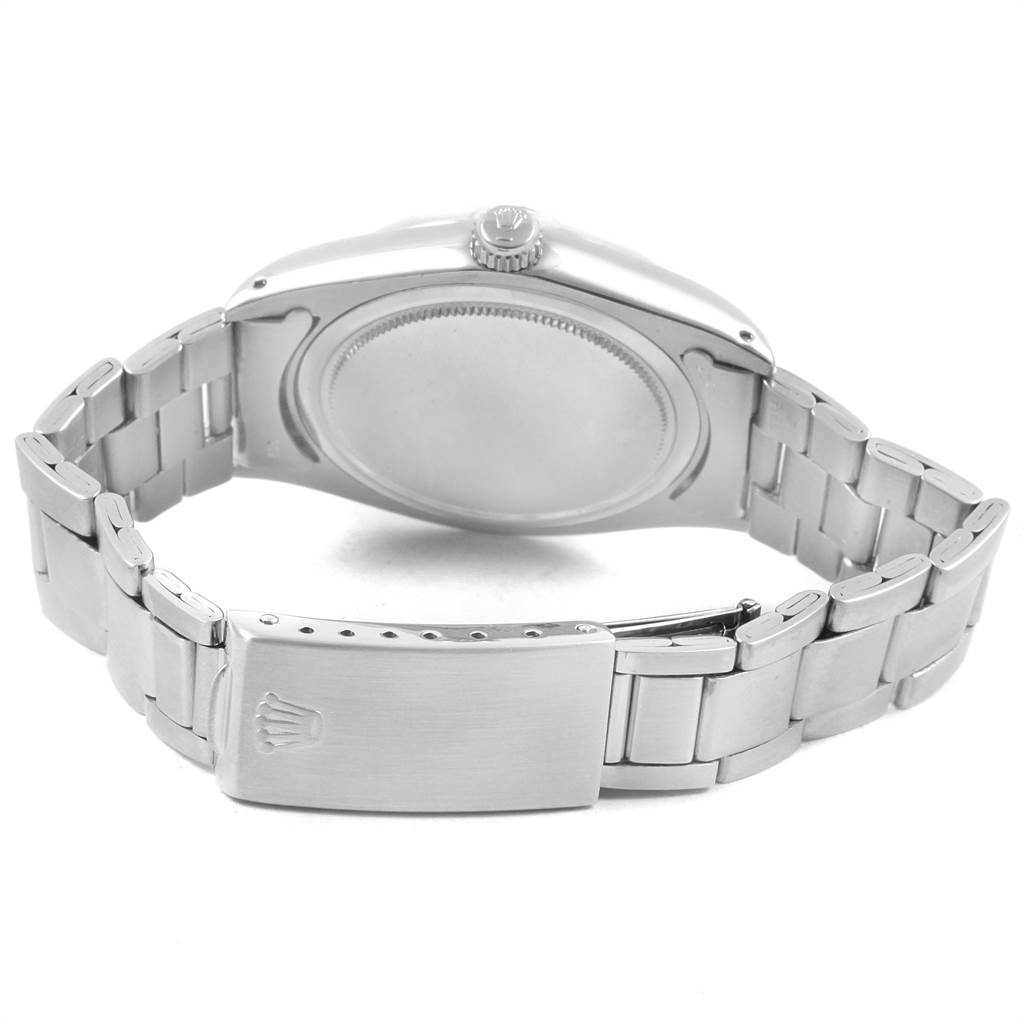 The image shows the back and clasp of a Rolex Vintage Collection 6694 Men
s Stainless Steel Silver Dial 6694 Men
s Stainless Steel Silver Dial watch from an angled rear view.