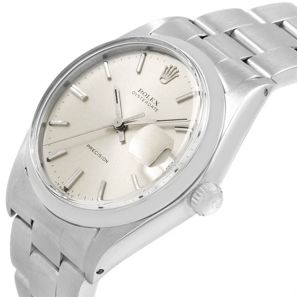 The image shows a side-angle view of the Rolex Vintage Collection 6694 Men
s Stainless Steel Silver Dial 6694 Men
s Stainless Steel Silver Dial watch featuring its dial, bracelet, and crown.