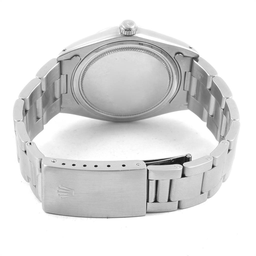 This image shows the back case and bracelet clasp of a Rolex Vintage Collection 6694 Men
s Stainless Steel Silver Dial 6694 Men
s Stainless Steel Silver Dial model.