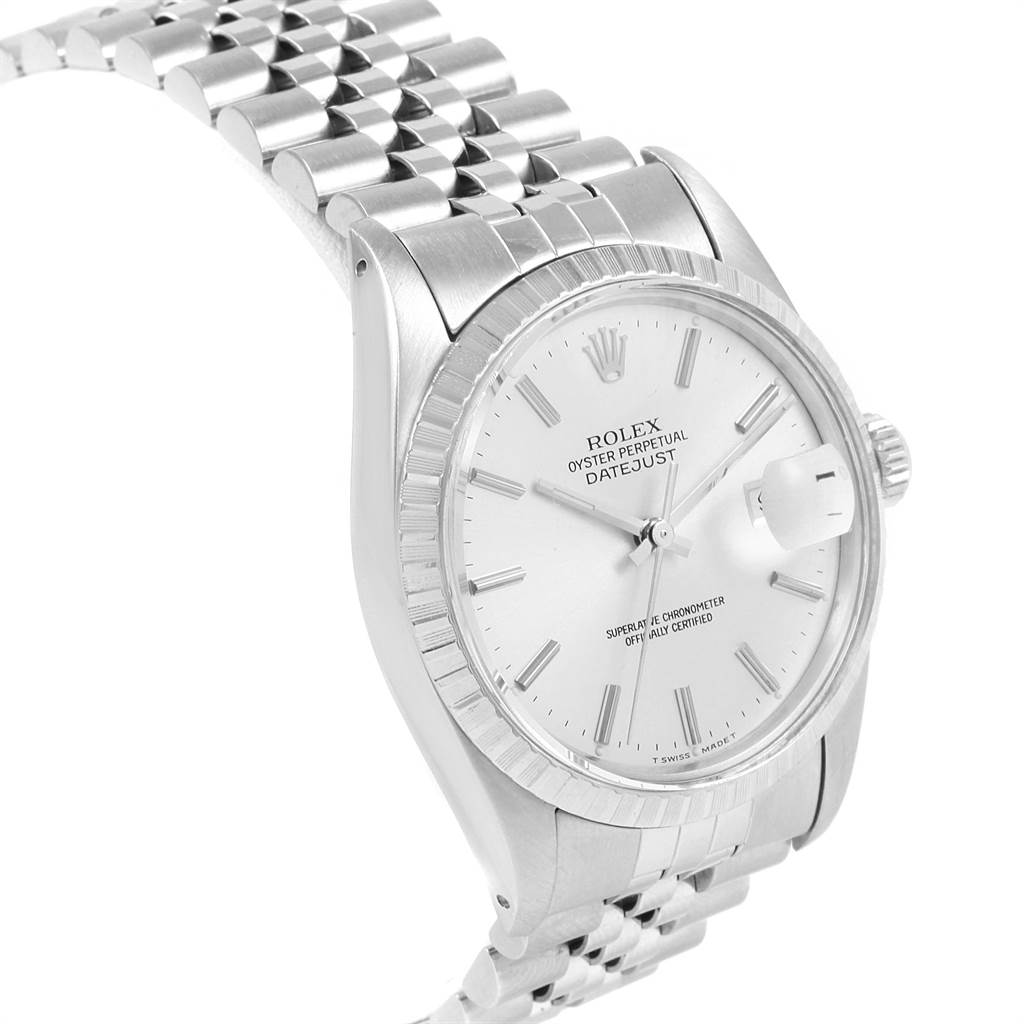 The image shows a close-up angle of the Rolex Vintage Collection 16030 Men
s Stainless Steel Silver Dial 16030 Men
s Stainless Steel Silver Dial Datejust watch, highlighting its dial, bezel, and part of the metal bracelet.