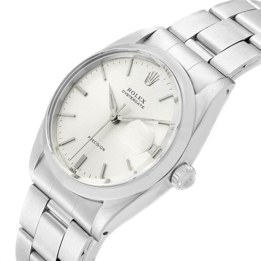 The Rolex Vintage Collection 6694 Men
s Stainless Steel Silver Dial 6694 Men
s Stainless Steel Silver Dial model Oysterdate is shown at an angled view highlighting the dial, crown, and stainless steel bracelet.