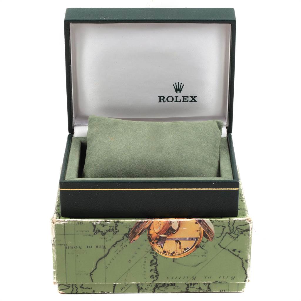 The image shows an open Rolex Vintage Collection 6694 Men
s Stainless Steel Silver Dial 6694 Men
s Stainless Steel Silver Dial watch box with a green cushion inside, viewed from the front angle.