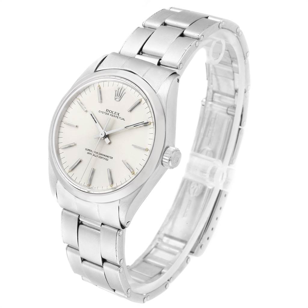 The Rolex Vintage Collection 1002 Men
s Stainless Steel Silver Dial 1002 Men
s Stainless Steel Silver Dial watch is shown at a three-quarter angle, displaying its face, bezel, and bracelet.