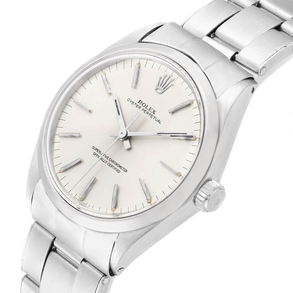 This image shows a close-up, angled view of a Rolex Vintage Collection 1002 Men
s Stainless Steel Silver Dial 1002 Men
s Stainless Steel Silver Dial model watch, highlighting the dial, crown, and part of the bracelet.