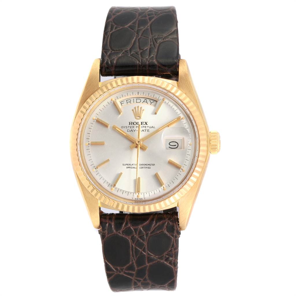 The Rolex Vintage Collection 1803 Men
s Yellow Gold Silver Dial 1803 Men
s Yellow Gold Silver Dial watch is shown from a top view, displaying the dial, hands, day-date feature, and leather strap.