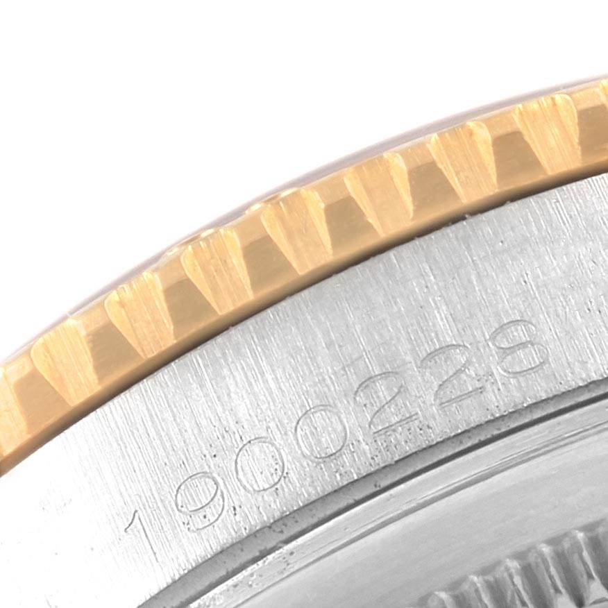 This close-up image shows the bezel and part of the case with a serial number of the Rolex Vintage Collection 1625 Men
s Steel and Gold (two tone) Silver Dial 1625 Men
s Steel and Gold (two tone) Silver Dial watch.