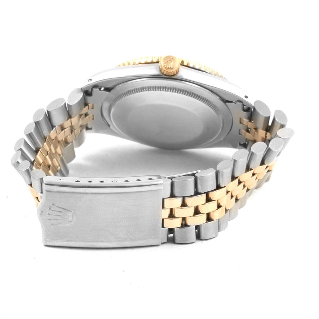 This image displays the backside and clasp of a Rolex Vintage Collection 1625 Men
s Steel and Gold (two tone) Silver Dial 1625 Men
s Steel and Gold (two tone) Silver Dial watch at an angled view.