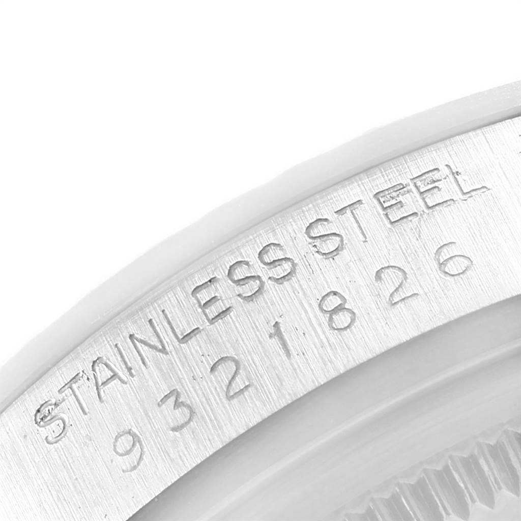 The image shows a close-up angle of the case back of the Rolex Vintage Collection 16030 Men
s Stainless Steel White Dial 16030 Men
s Stainless Steel White Dial watch, highlighting the engraved stainless steel and serial number.