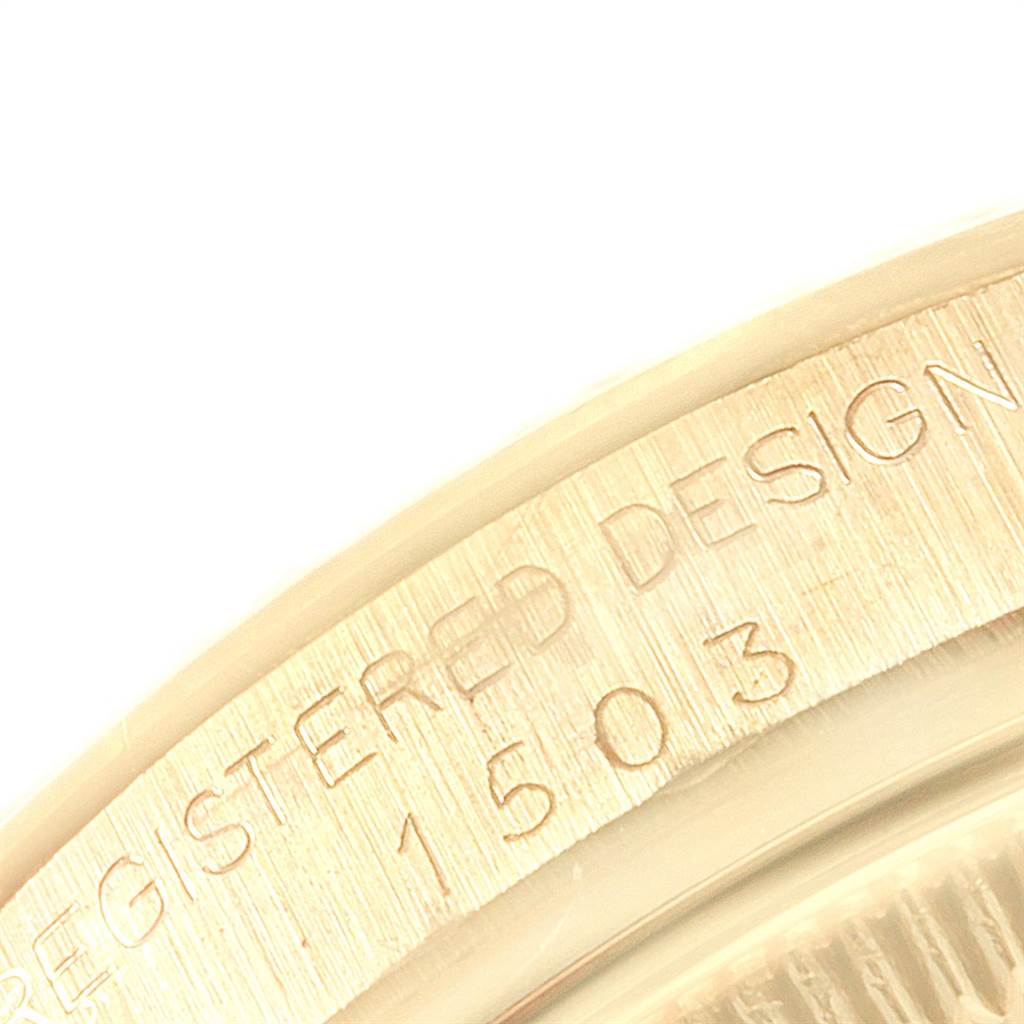This image shows a close-up of the engraved bezel of the Rolex Vintage Collection 1503 Men
s Yellow Gold Champagne Dial 1503 Men
s Yellow Gold Champagne Dial model.