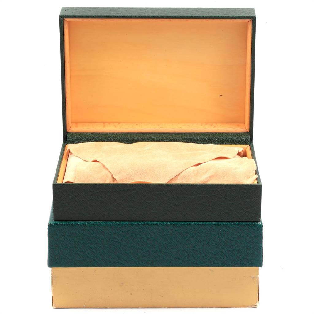 The image shows an open box for the Rolex Vintage Collection 1503 Men
s Yellow Gold Champagne Dial 1503 Men
s Yellow Gold Champagne Dial watch, revealing its inner lining and a cloth inside.