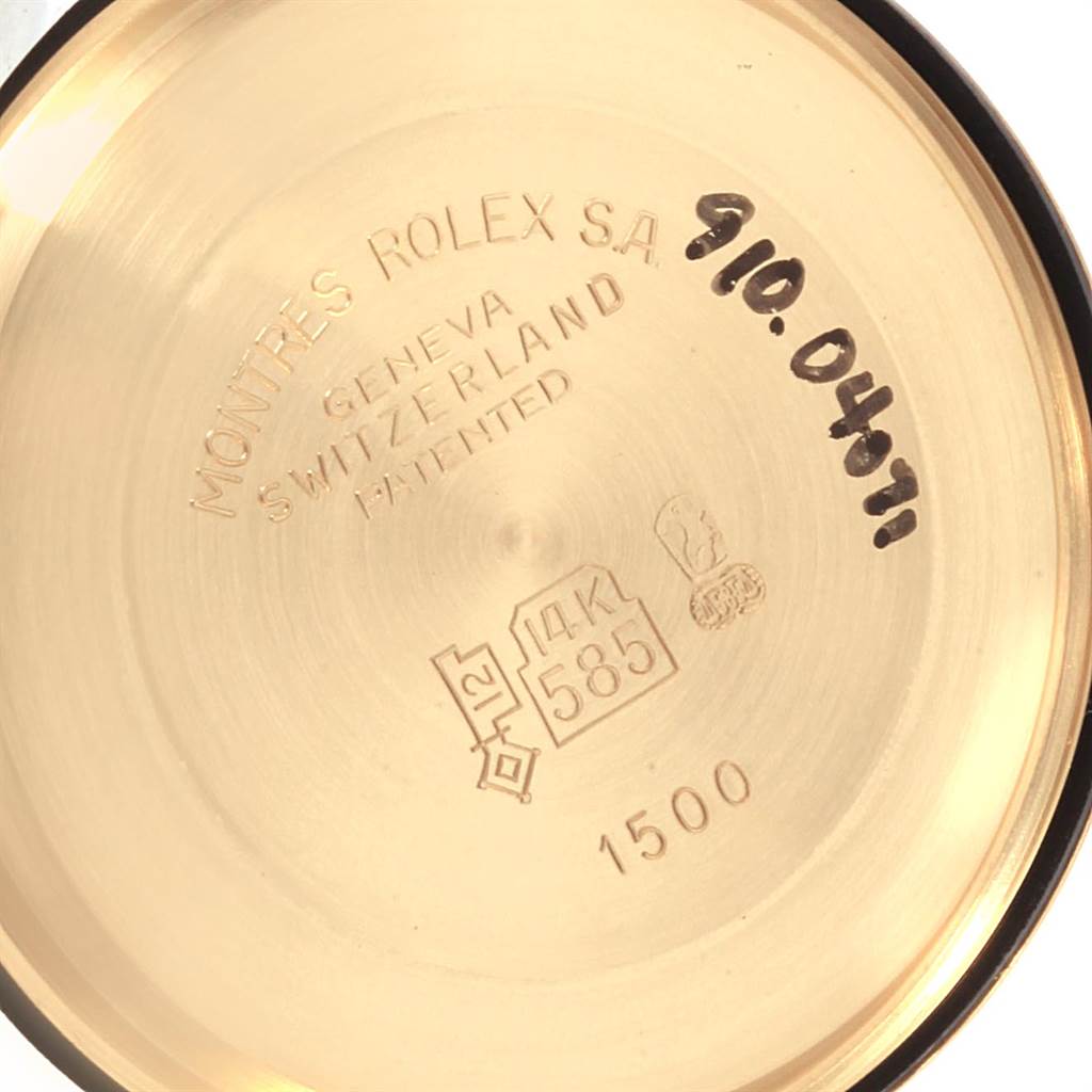 The image shows the inner case back of the Vintage Collection model watch by Rolex, featuring engraved text and hallmarks.